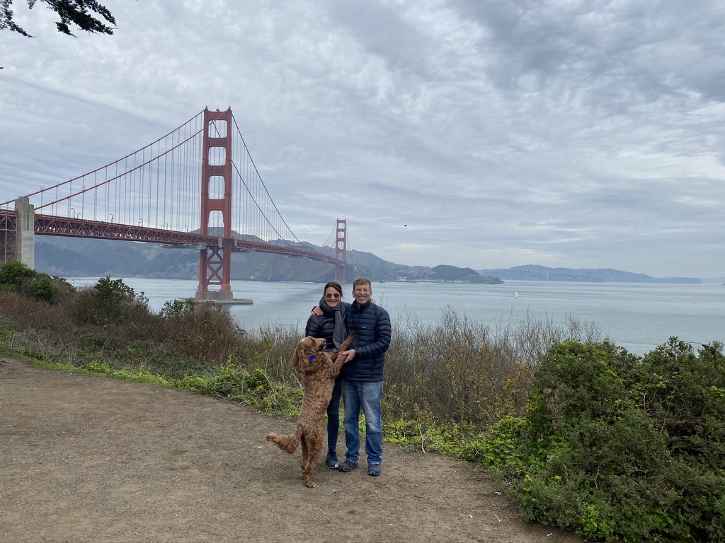 Shannon and family with dog at the Golden Gate Bridge